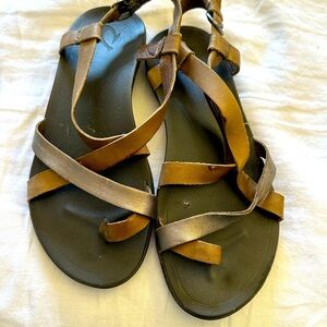 Women seize 7 Olukai leather sport sandals